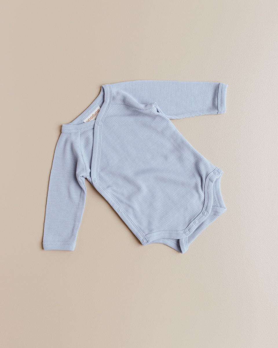 unaduna wrap around baby body tiny rib wool:silk blue bird